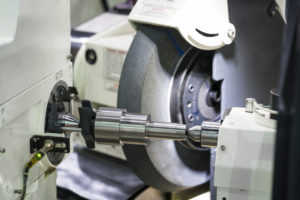 operator grinding and inspection high precision automotive part